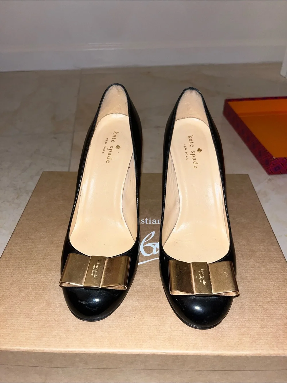 kate spade Black Patent Leather Pumps with Gold Bow Accent